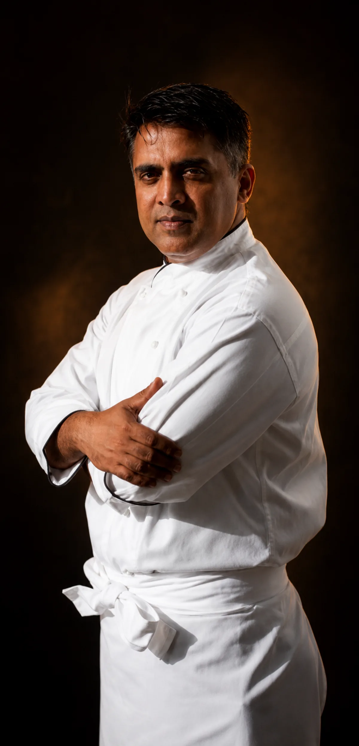 Chef Narayan in a white chef jacket